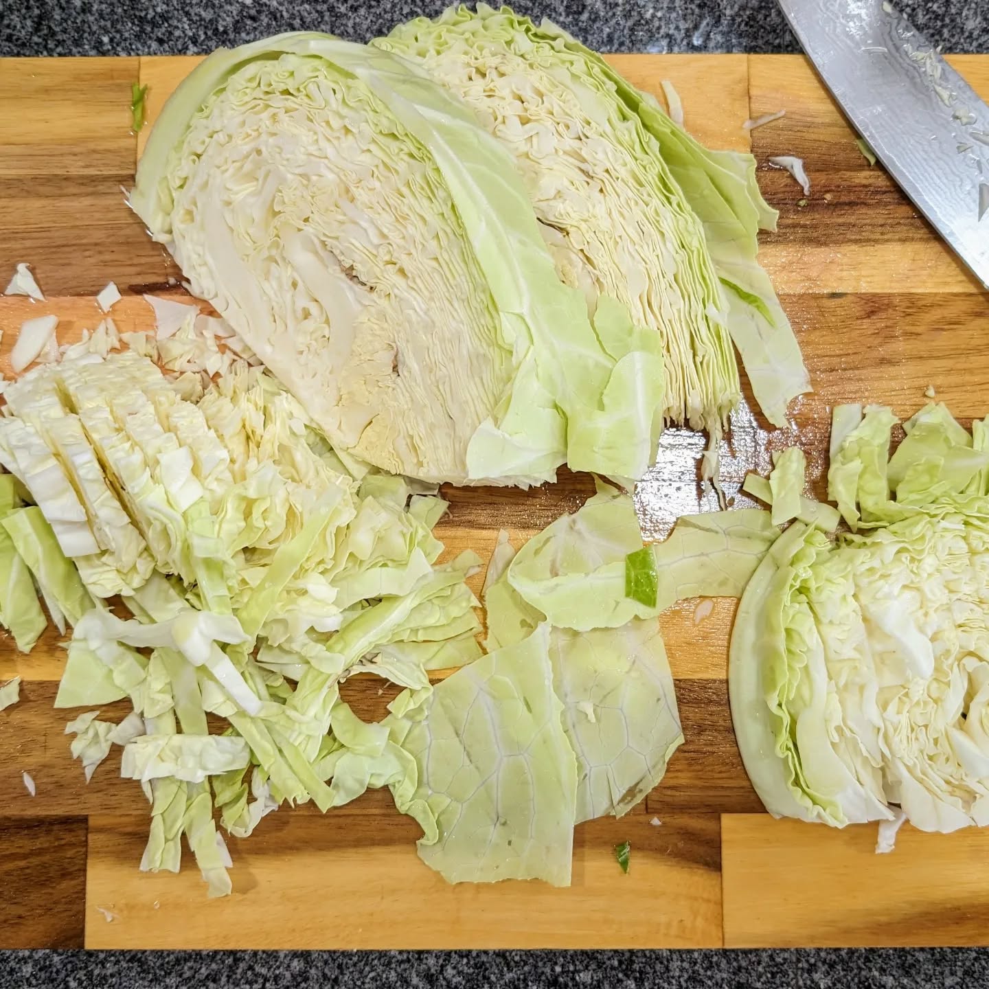 Making sauerkraut with cabbage from the garden.