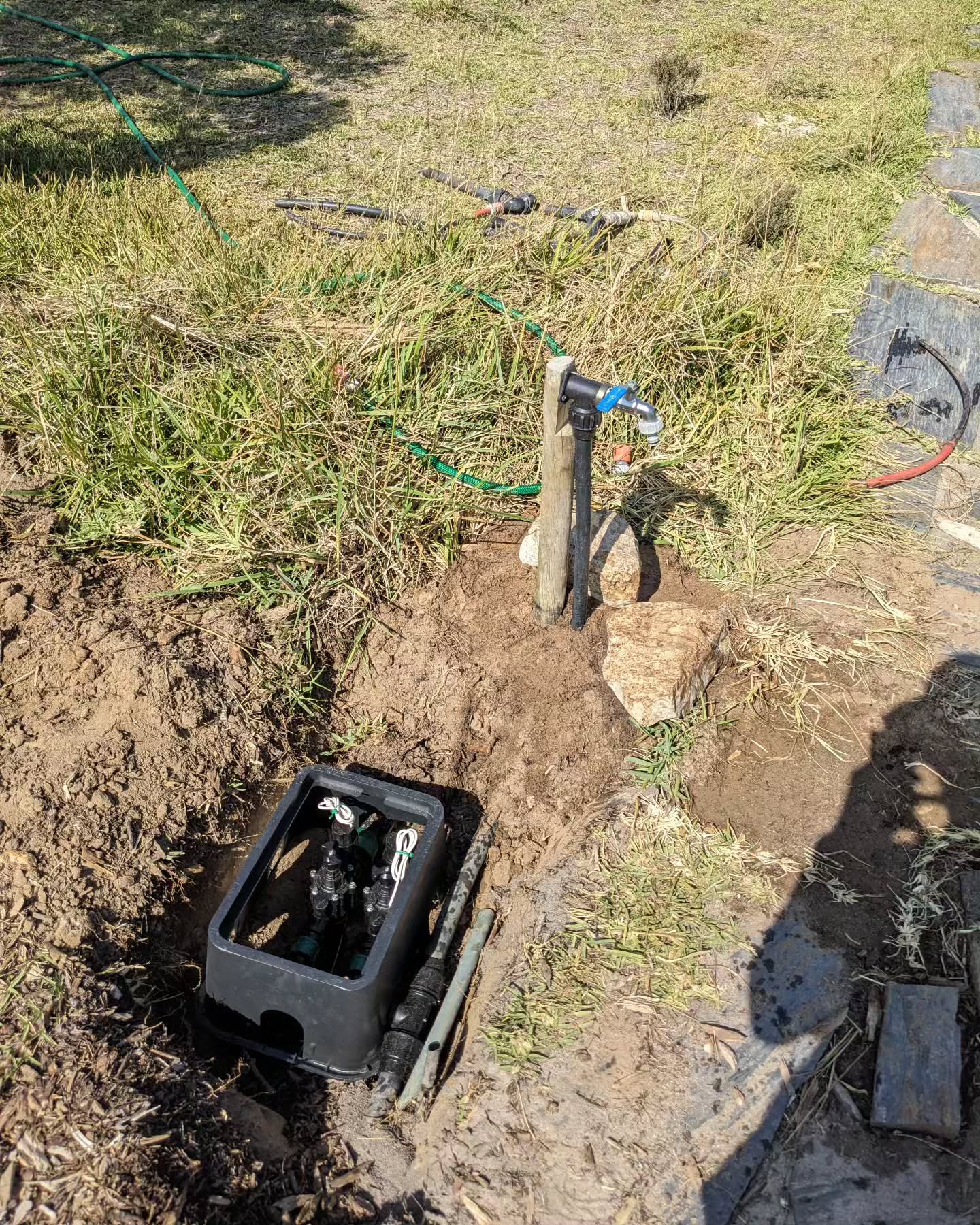 Continuing work on the zone 1 irrigation plumbing.