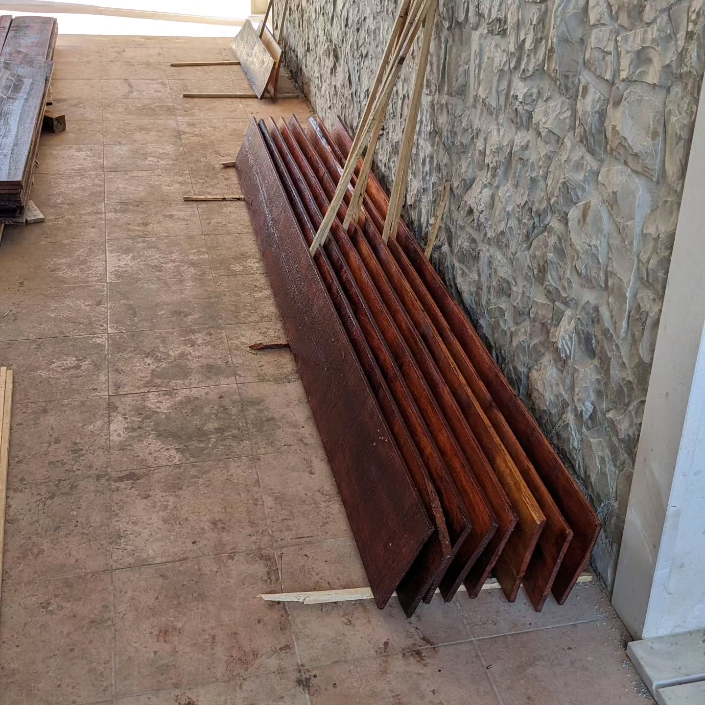 The second coat of varnish for the next poultry house is done.