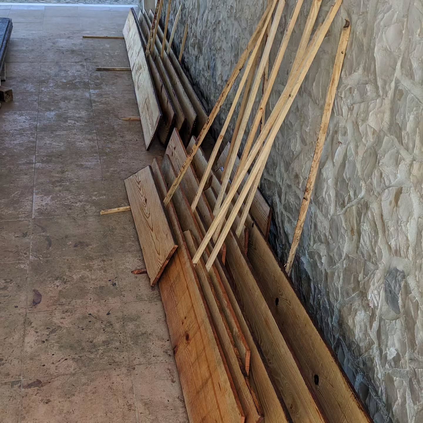 Ongoing work on the second coat of varnish for the next poultry house.