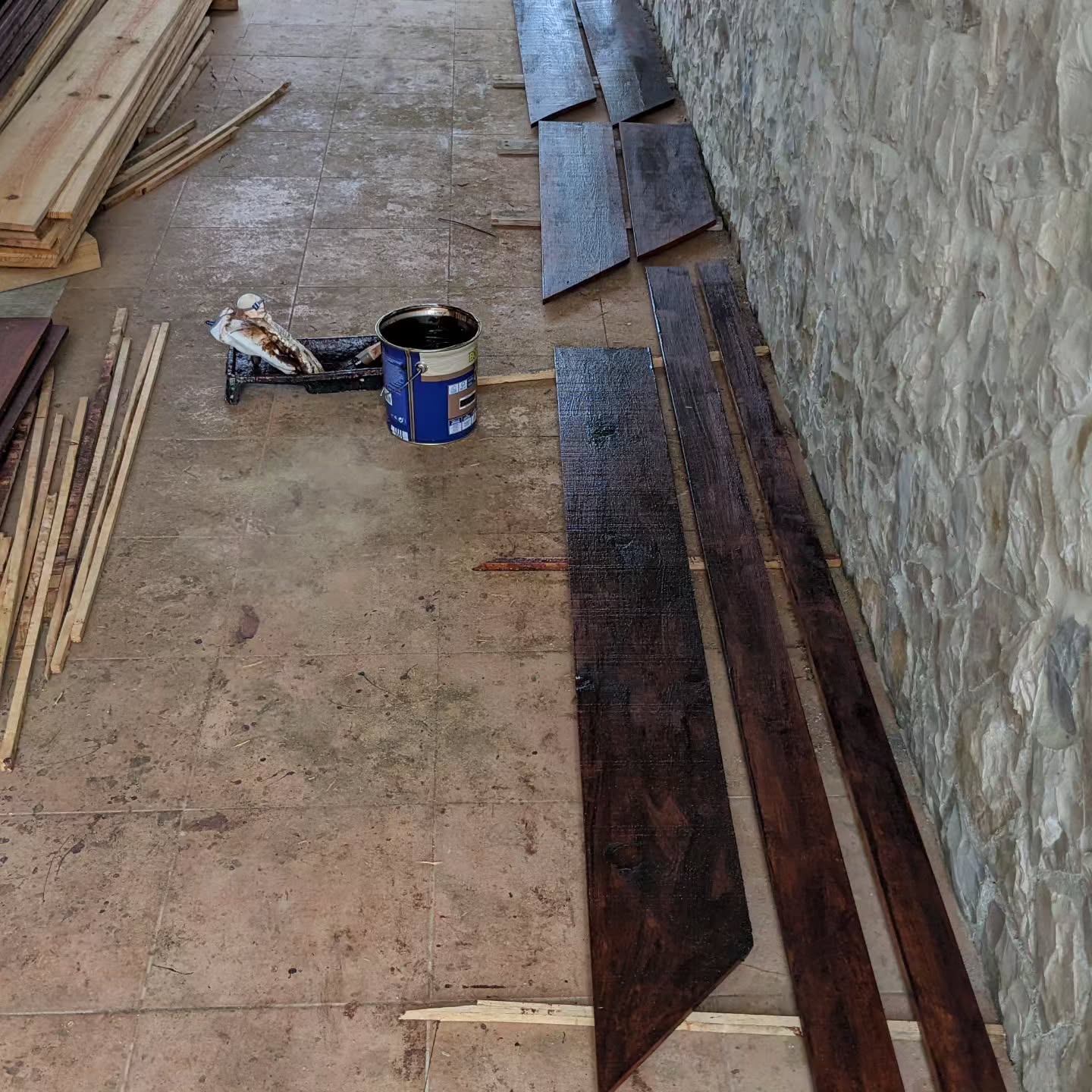 Varnishing planks for the next bird house.
