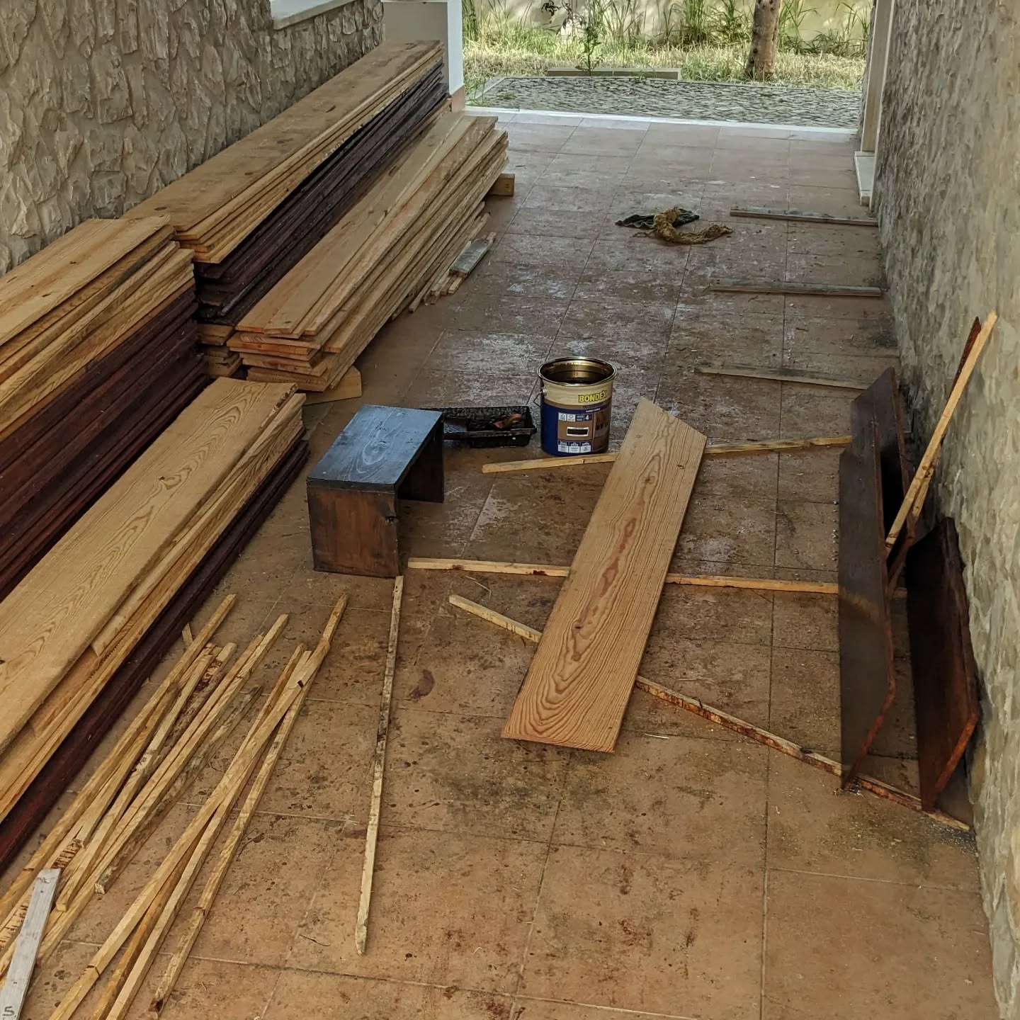 Varnishing planks for the new duck coops.