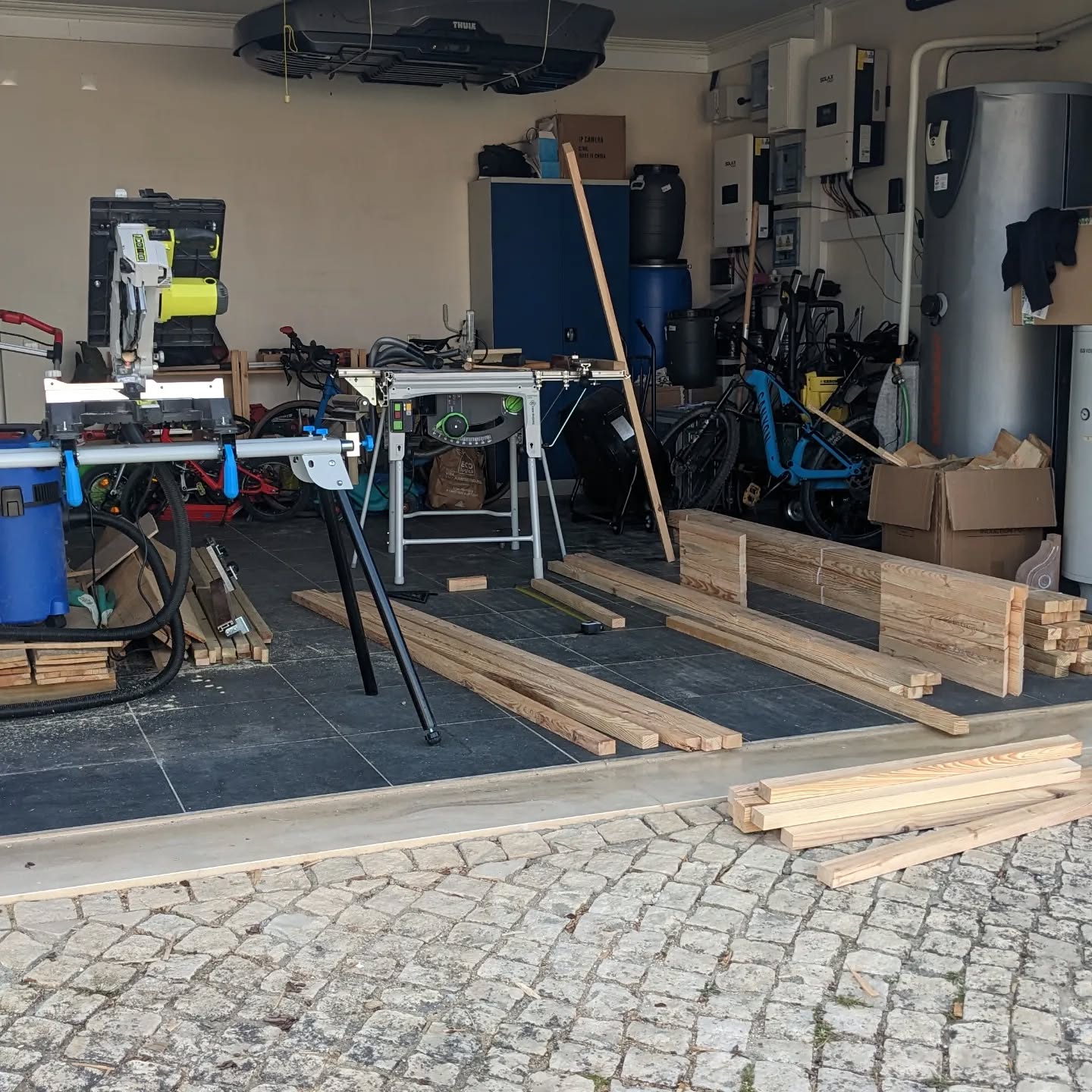 Cutting lumber to make more duck houses.