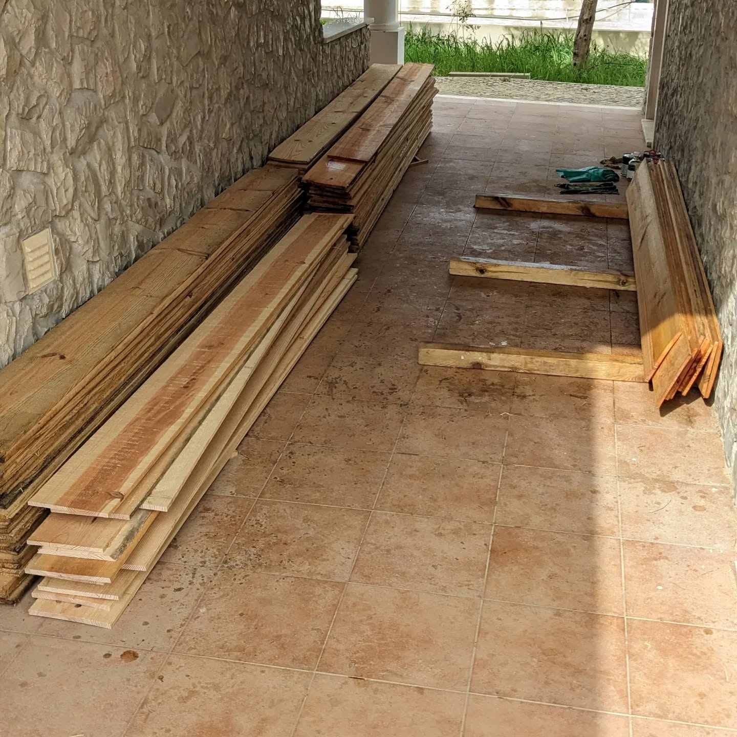 Labor intensive protective coating for the new duck coops ongoing.