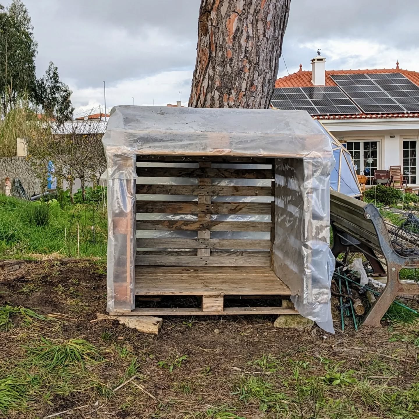 Turned a bunch of pallets lying around into a playhouse for the children.