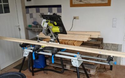 Another rainy weather project: cutting lumber for the #greenhouse cover.