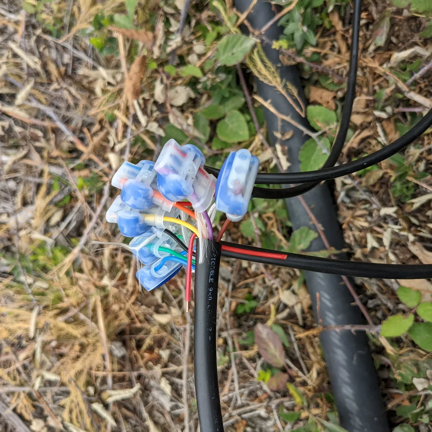 9 core valve control cable spliced with a 5 core and two 3 core ones.