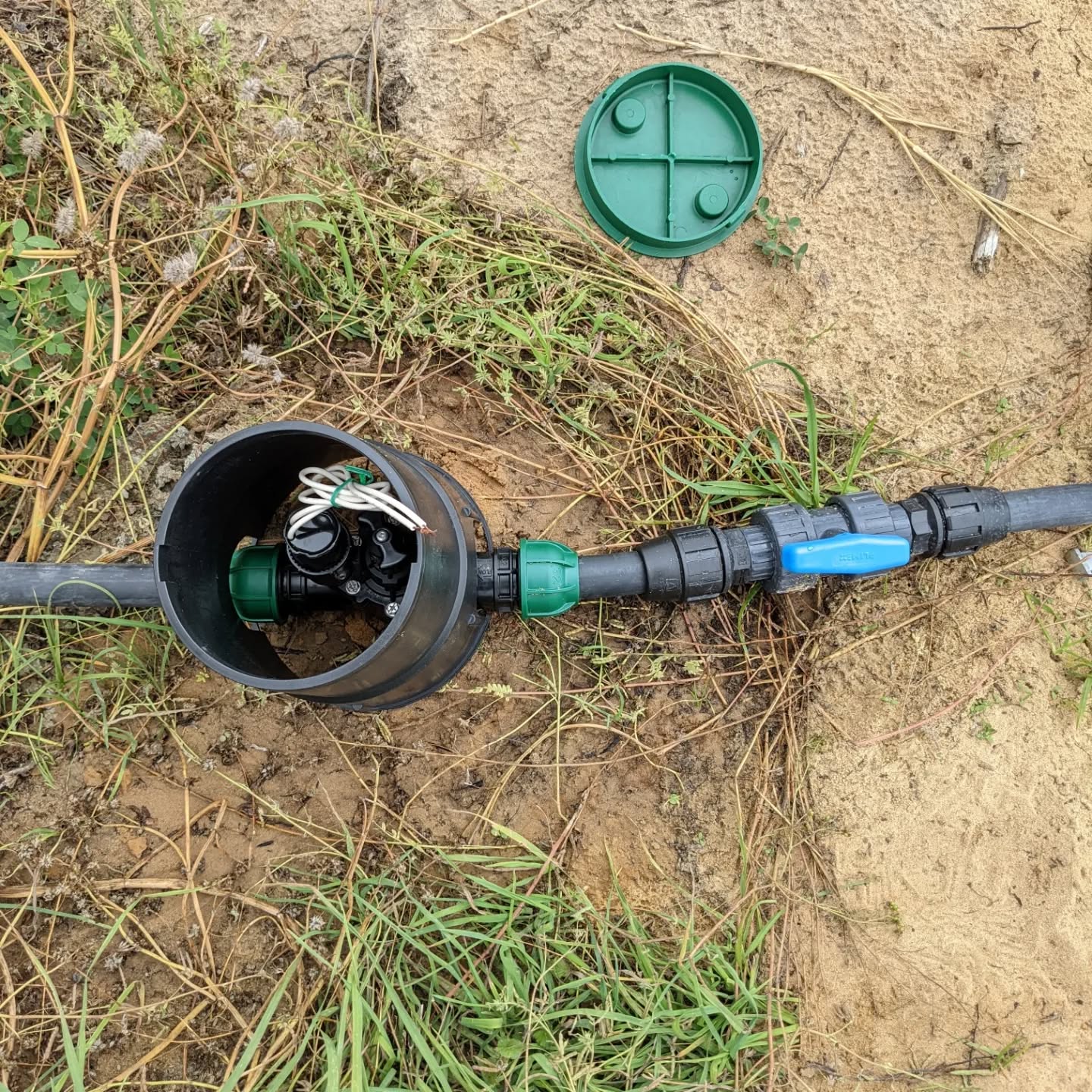 Testing a solenoid valve to see if it would work and if the pressure drop still allows an irrigation zone to run. I used a regular 9V battery to trigger it to avoid running long wires for a test.