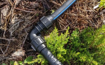 Installing L fittings at the corners of the #irrigation mainline. We had just bent the tube when laying it down, now it’s a little neater and under less tension.