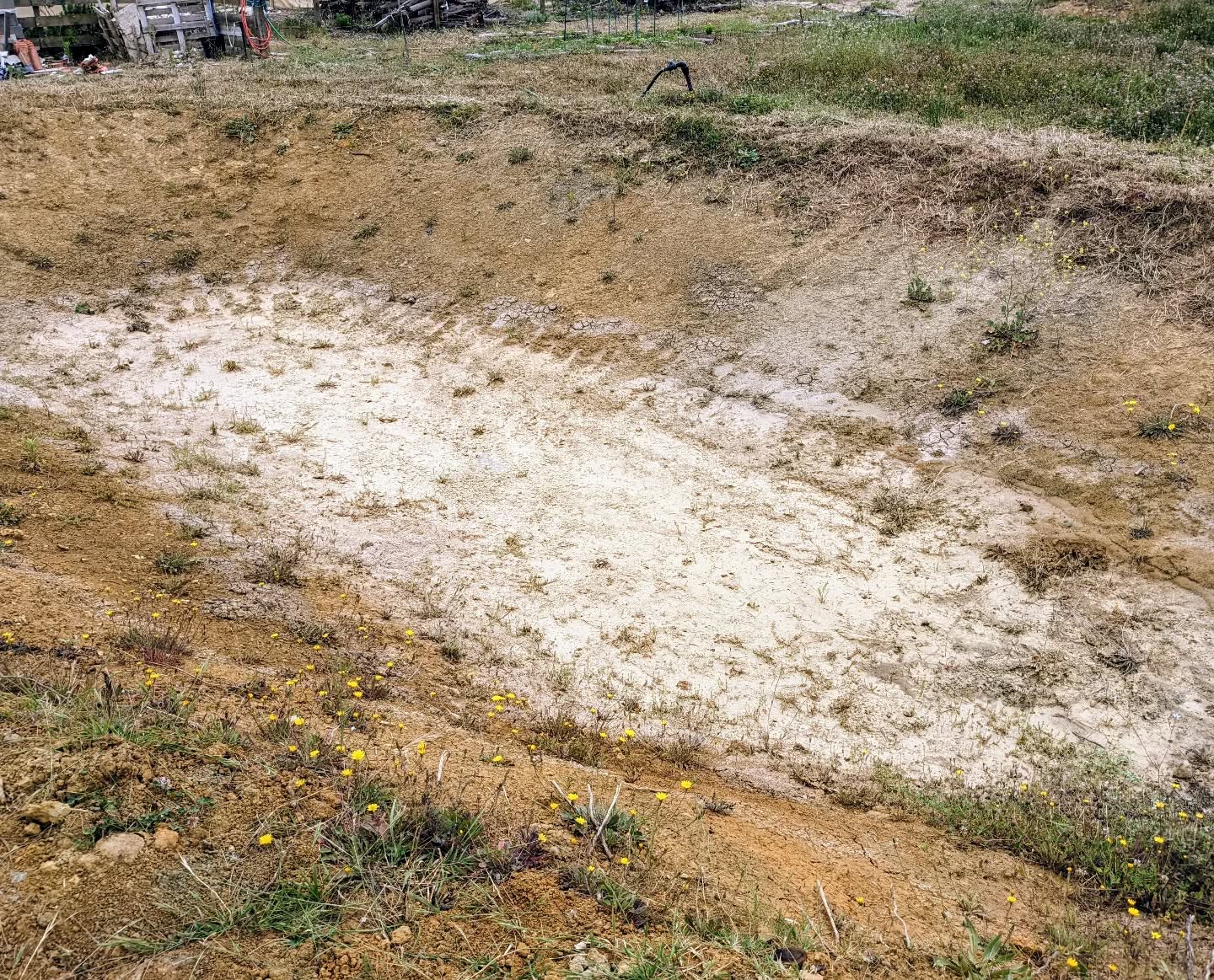 Despite all the #bentonite and hope, the east #pond is completely dry as of this morning. It slowly but steadily drained over the past few days.