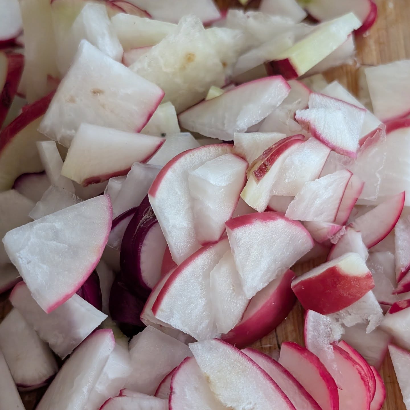 Radishes from our garden being prepared for breakfast. Yummy 😋
